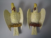 Pair Bretby Majolica parrot/cockatoo wall pockets