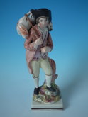 Staffordshire Pearlware Shepherd carrying sheep