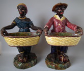 Pair Majolica blackamoor figures holding baskets