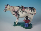 Staffordshire Pearlware cow and milkmaid creamer