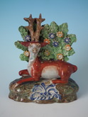 Pearlware Staffordshire stag with bocage figure