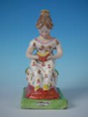 Staffordshire Pottery Pearlware Cottage Girl reading figure