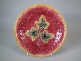 Majolica Plate with Leaves on red basket ground