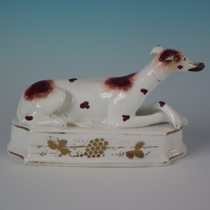 Staffordshire Pottery Recumbent Hound Figure