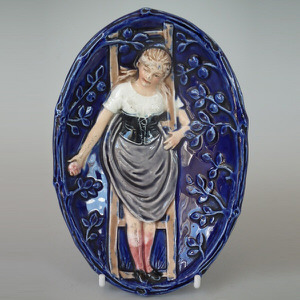 Majolica lady on ladder dish