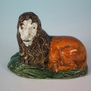 Small Staffordshire Prattware Lion figure
