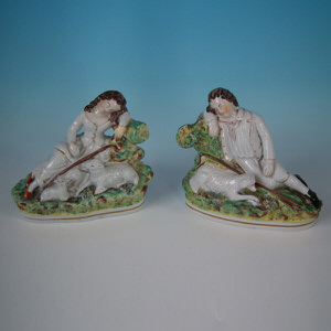 Pair Staffordshire recumbent shepherds