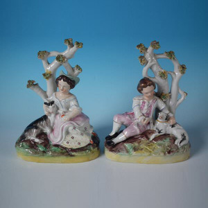 Pair Staffordshire figures : boy with dog & girl with goat