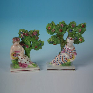 Pair Staffordshire Pearlware child with basket figures